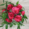 Small pink rose arrangement in basket