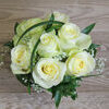 Small white rose arrangement in a basket