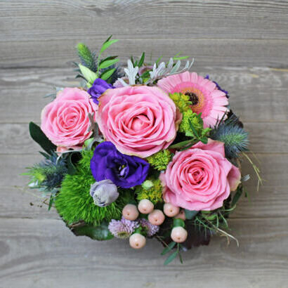 Salmon floral arrangement in basket