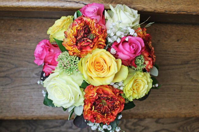 Mixed rose arrangement in basket