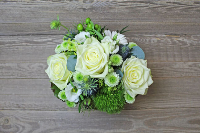 White floral arrangement in basket